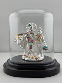 Load image into Gallery viewer, 999 Pure Silver Radha Krishna Idol in Protective Acrylic Dome – Divine Couple Murti with Green Details/ 73G
