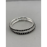 Load image into Gallery viewer, Original view of silver kids bangle pair with black stones
