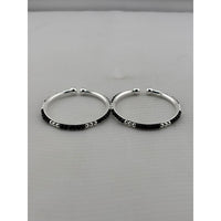 Load image into Gallery viewer, 925 sterling silver kids bangle pair front view showing black bead pattern and silver accents
