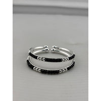 Load image into Gallery viewer, 925 sterling silver kids bangle pair with black beads and polished silver accents
