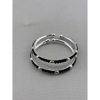 Load image into Gallery viewer, Kids silver bangle pair angled view
