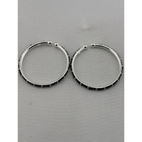 Load image into Gallery viewer, Silver baby bangle pair front view
