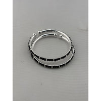 Load image into Gallery viewer, Silver baby bangles with black stones stacked view
