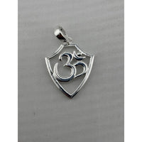 Load image into Gallery viewer, Close-up of a polished 925 sterling silver Om pendant in a shield-shaped frame
