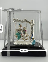 Load image into Gallery viewer, 999 Pure Silver Radha Krishna on Swing Idol 56gm in Protective Acrylic Dome – Divine Couple Murti for Mandir
