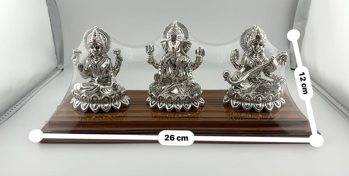 Silver 99.9% pure Laxmi Ganesh Saraswati Idol with (Dwar and wooden frame)