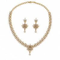 Load image into Gallery viewer, Gold-plated 925 sterling silver crystal necklace and matching earrings set on pure white background
