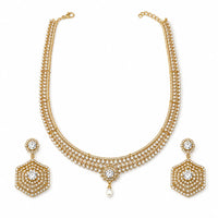 Load image into Gallery viewer, Gold-plated crystal necklace and matching hexagonal earrings set on white background
