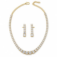 Load image into Gallery viewer, Gold-plated 925 sterling silver graduated tennis necklace and earrings set on white background
